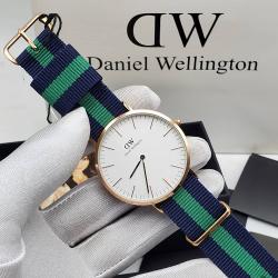 DANIEL WELLINGTON EXCLUSIVE BLACK AND GREEN LEATHER WRISTWATCH WITH GOLD AND WHITE FACE (SAWW) - DELUXE.COM.NG