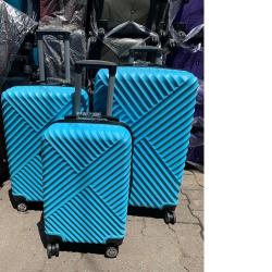 Turquoise Blue Luggage - Deluxe.com.ng
