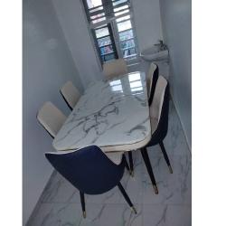 QUALITY DESIGNED CREAM MARBLE DINING TABLE & 6 CHAIRS- AVAILABLE (CHILU) - deluxe.com.ng