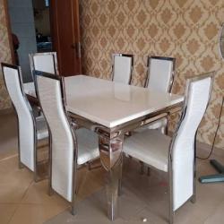 WHITE RECTANGULAR MARBLE TOP DINING TABLE WITH SILVER LEGS BY 6 WHITE CHAIRS WITH SILVER LEGS (NAFU)